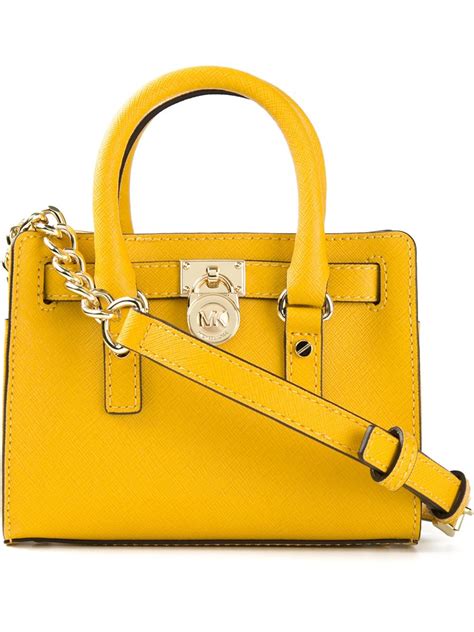 can you wash a michael kors yellow color purses bag|Michael Kors dust bag missing.